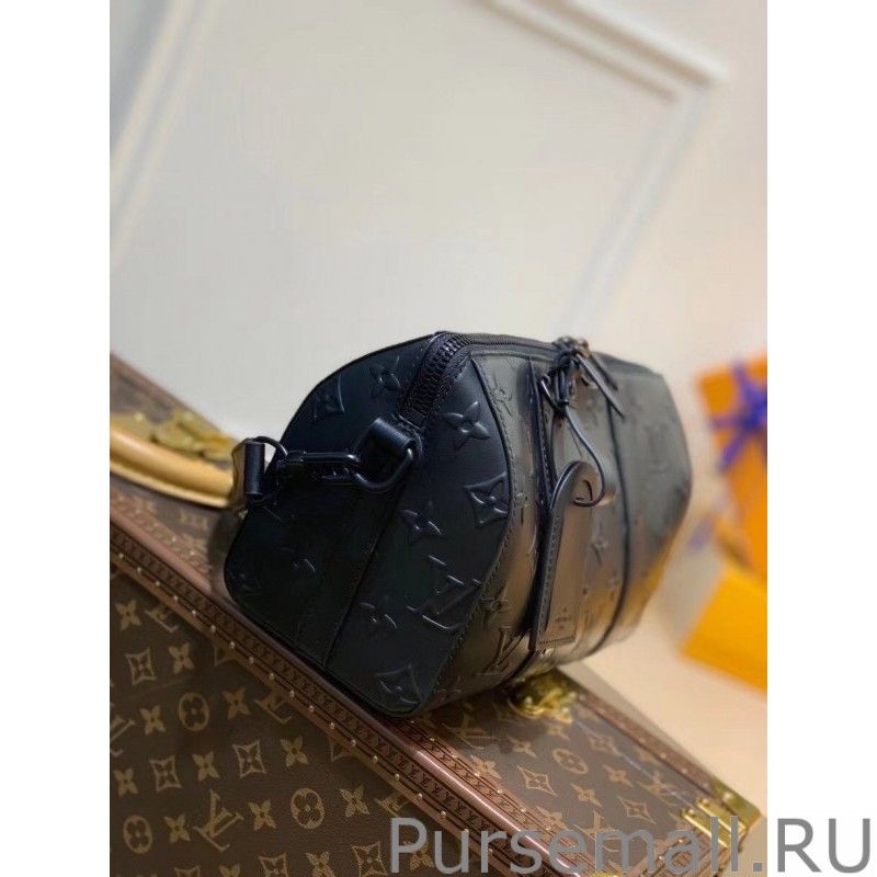 City Keepall Bag In Monogram Seal Leather M57955