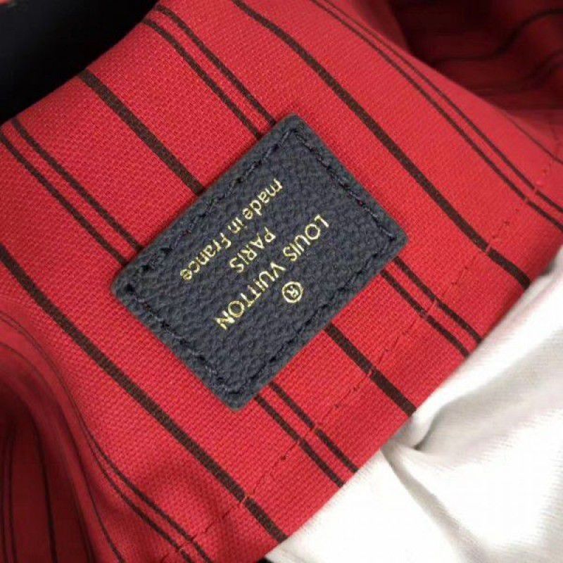 Montaigne MM Bag Monogram Empreinte M42746