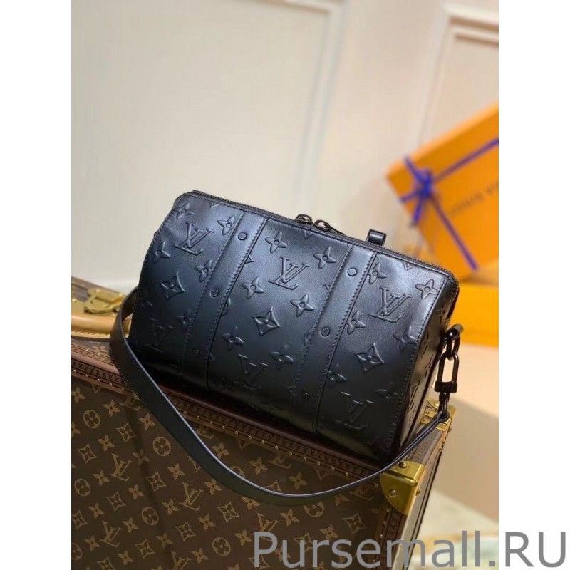 City Keepall Bag In Monogram Seal Leather M57955