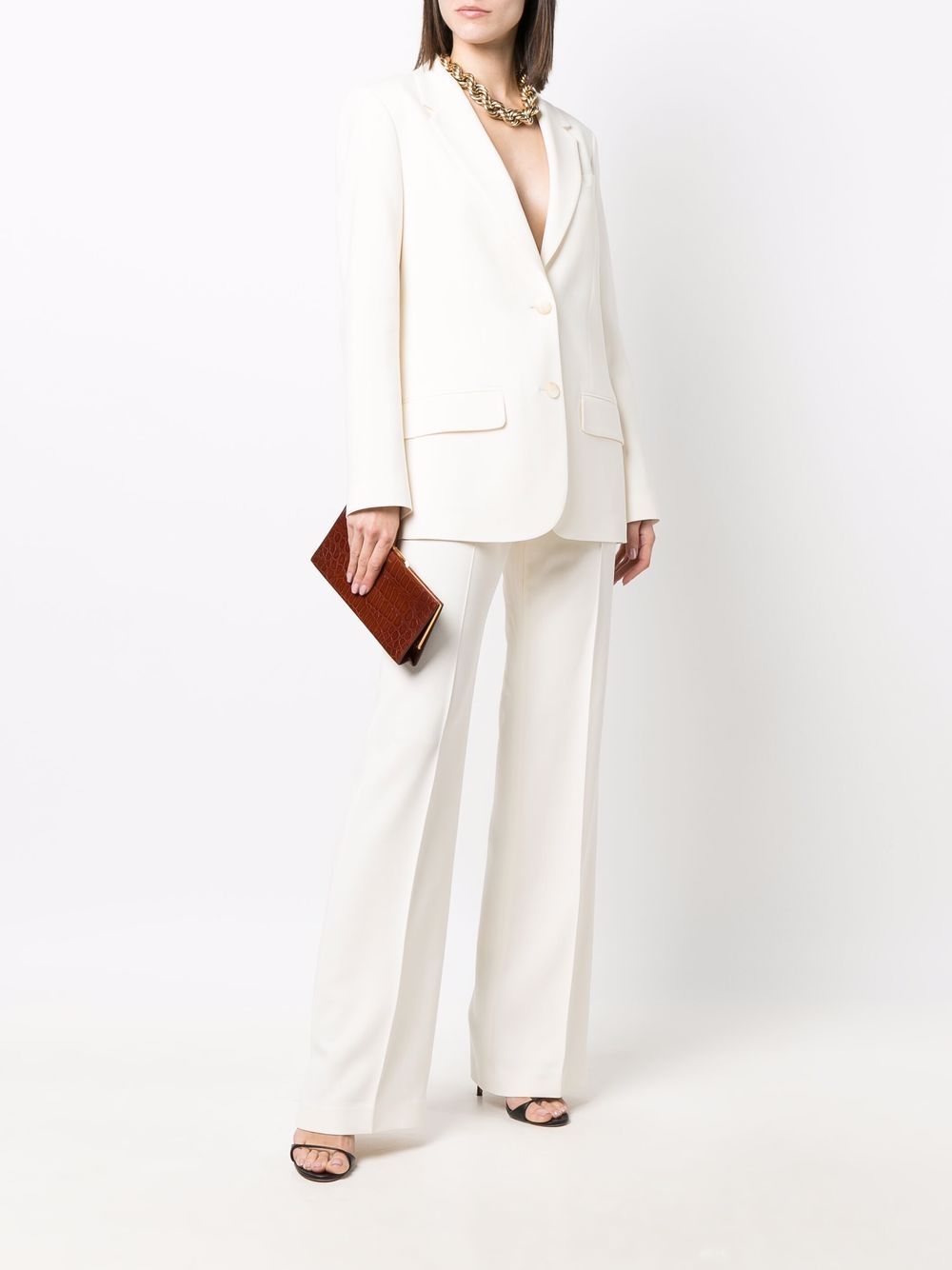 Saint Laurent crocodile-effect clutch bag