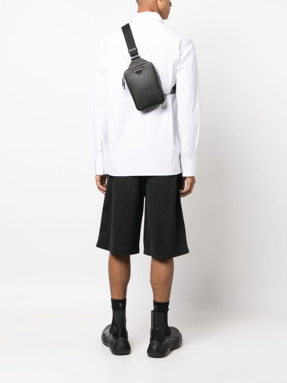 Pra*a triangle-logo leather messenger bag