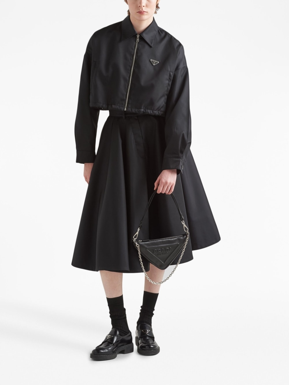 Pra*a triangle leather mini bag