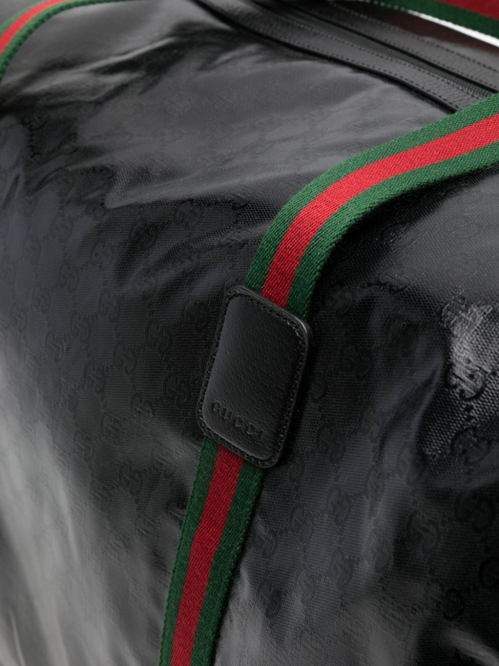G*u*i large web-detail leather holdall