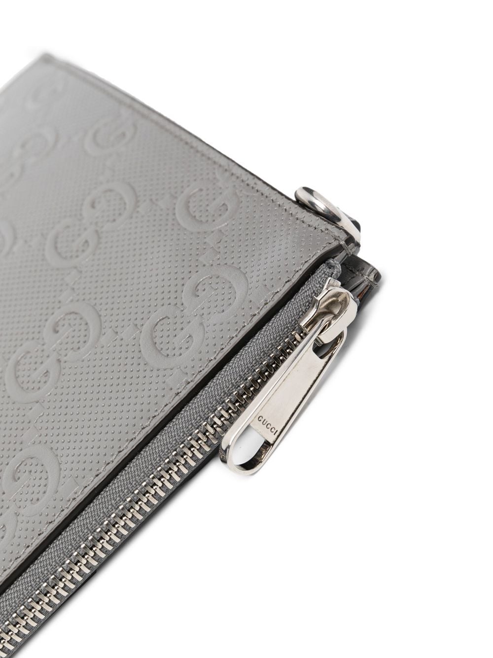 G*u*i gg monogram-embossed clutch