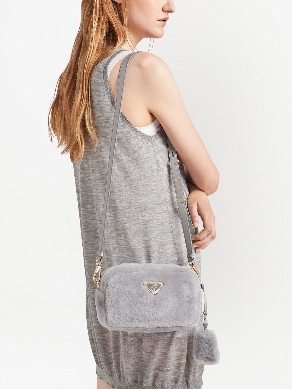 Pra*a triangle-plaque shearling shoulder bag
