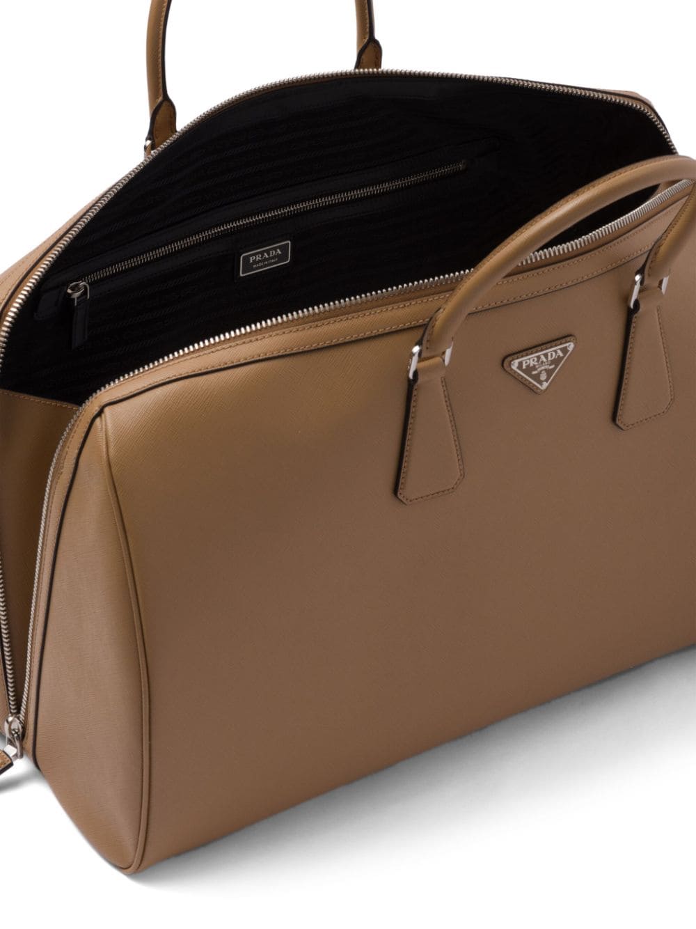 Pra*a triangle-logo leather bag